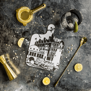 black and white illustrated chopping board featuring landmarks and monuments from whitley bay