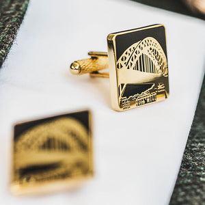 Newcastle city themed cufflinks in gold and black