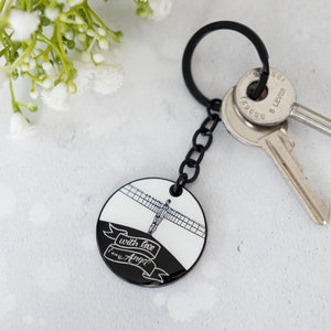 white and black illustrated enamel keyring of the angel of the north by powder butterfly