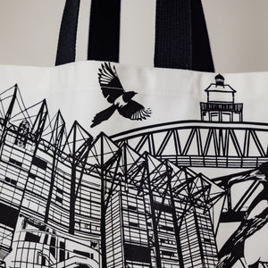closeup of a magpie on the newcastle landmarks tote bag by powder butterfly