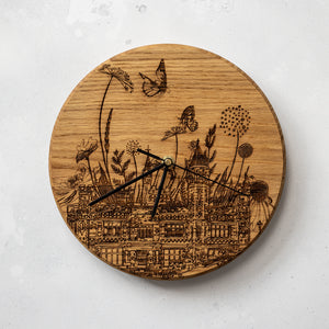Front facing view of the woodburned saltwell park clock by powder butterfly featuring landmarks and icons