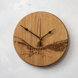 Sycamore gap woodburned clock by powder butterfly with black hands and whit ebackground