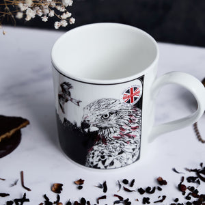 ceramic white mug featuring a black and white illustration of a red kite by powder butterfly