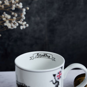 closeup of the Dunston staiths mug featuring the inside of the mug and the words "staiths" in a banner.