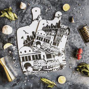 black and white illustrated chopping board with landmarks and monuments from whitley bay