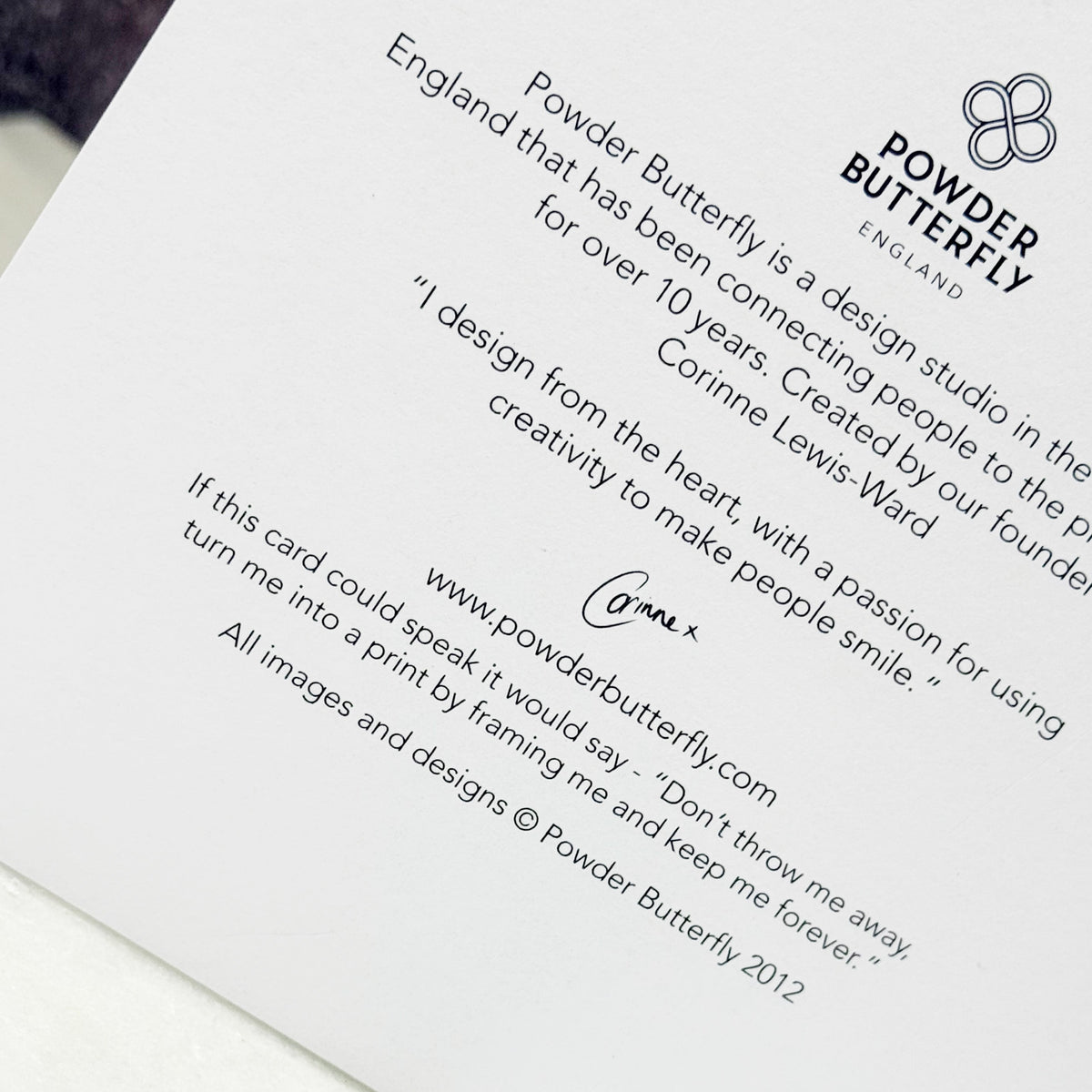White card with text and Powder Butterfly logo on a white background