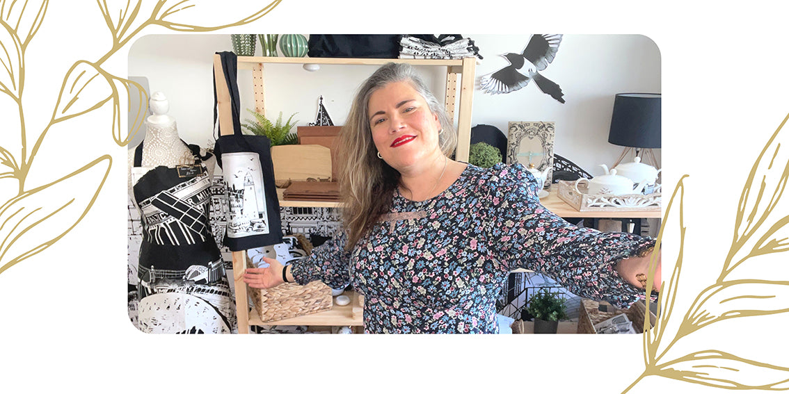 An image of Corinne presenting a wide collection of her landmark themed gifts