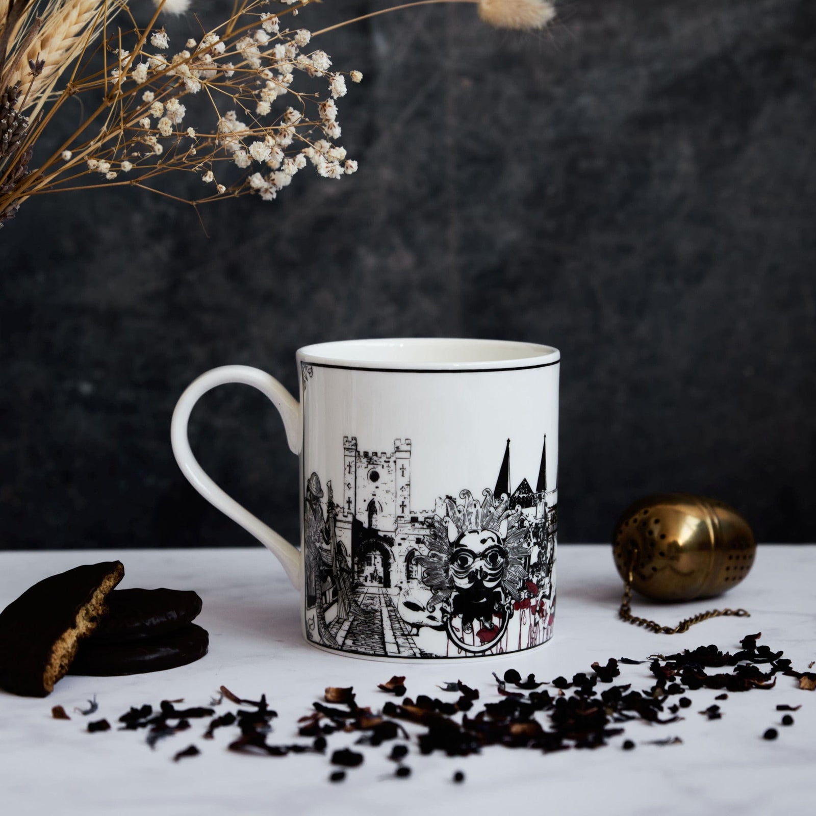 White ceramic mug by powder butterfly featuring a black and white illustration showing Durham city's famous landmarks and features