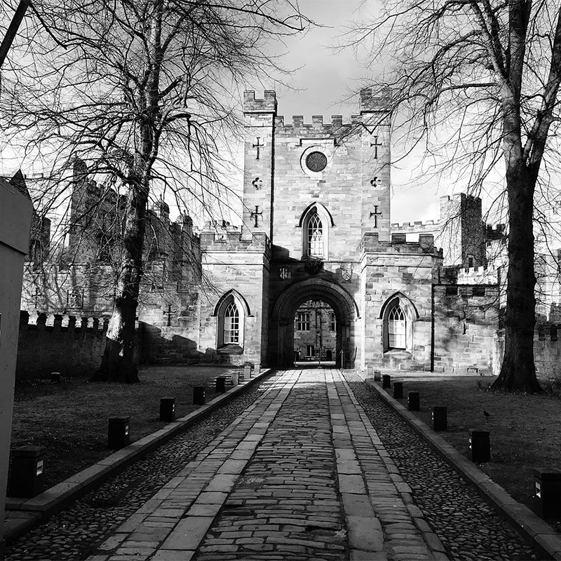 black and white image of Durham city gatehouse.