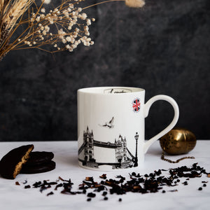 Fine china mug made in the potteries featuring London landmarks including Tower Bridge a London lamppost and pigeons.