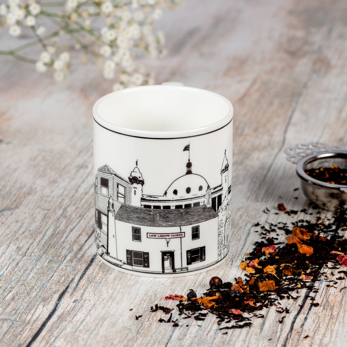 Front facing image of the North Tyneside mug featuring famous landmarks by Powder Butterfly.