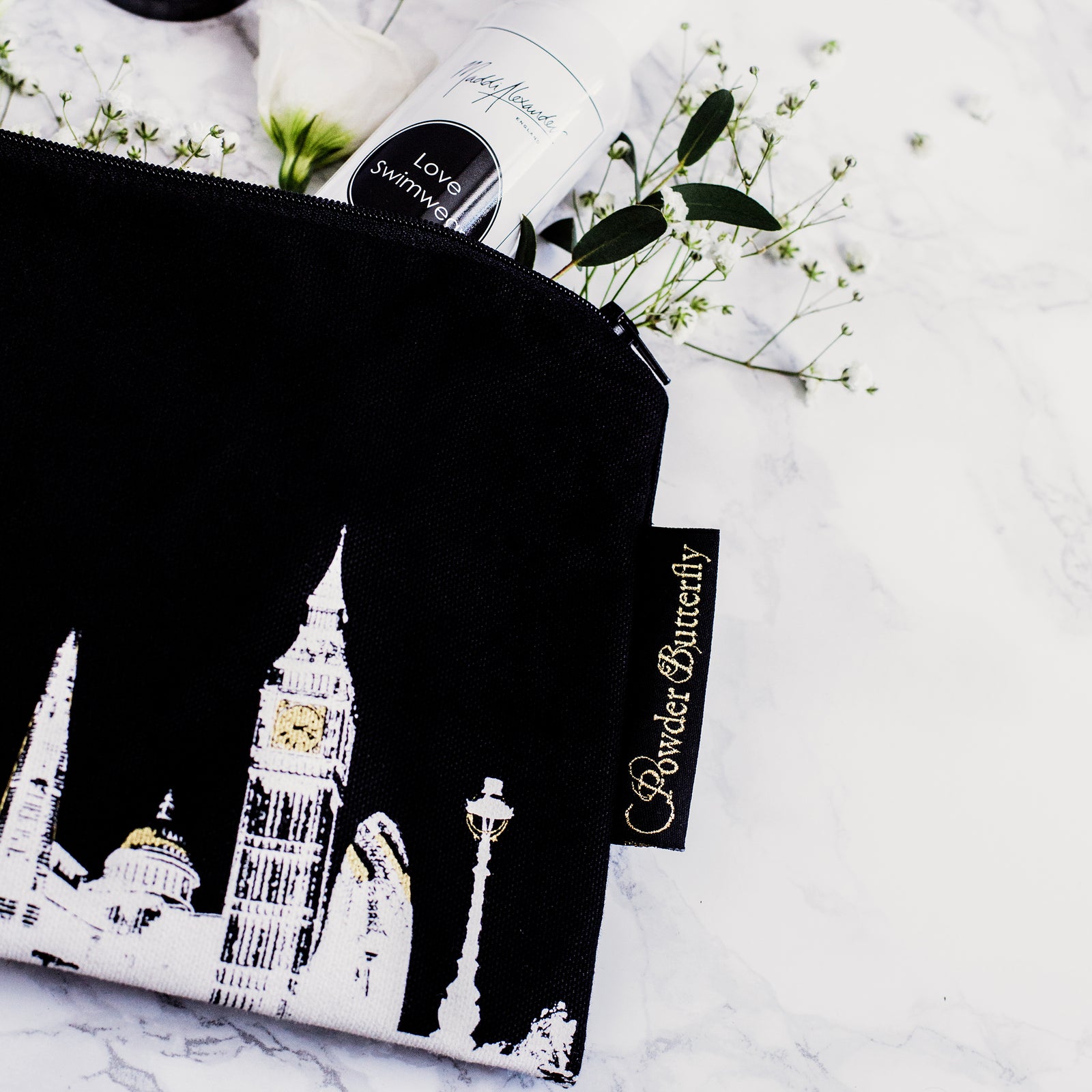 Powder Butterfly london city themed beauty bag featuring famous london landmarks