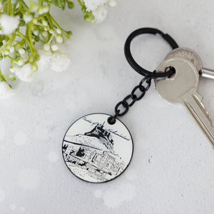 Powder Butterflys enamel keyring illustrated with northumberland castles in black and white