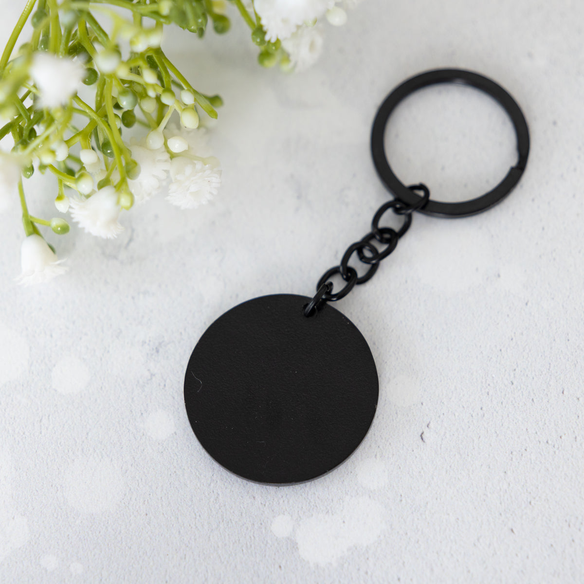 rear side of the angel of the north keyring by powder butterfly