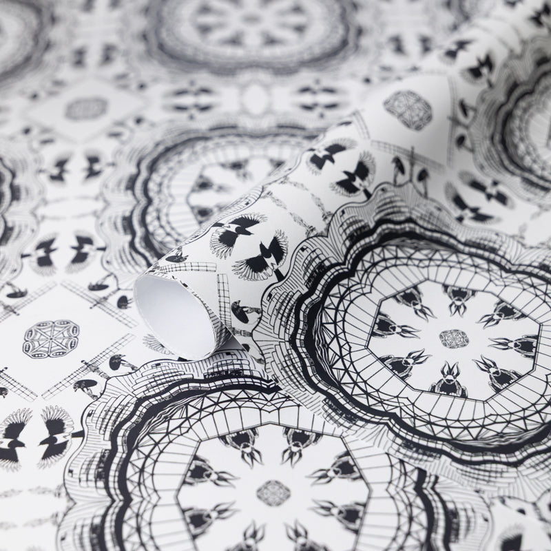 Close up of black and white patterned wrapping paper featuring newcastle landmarks 