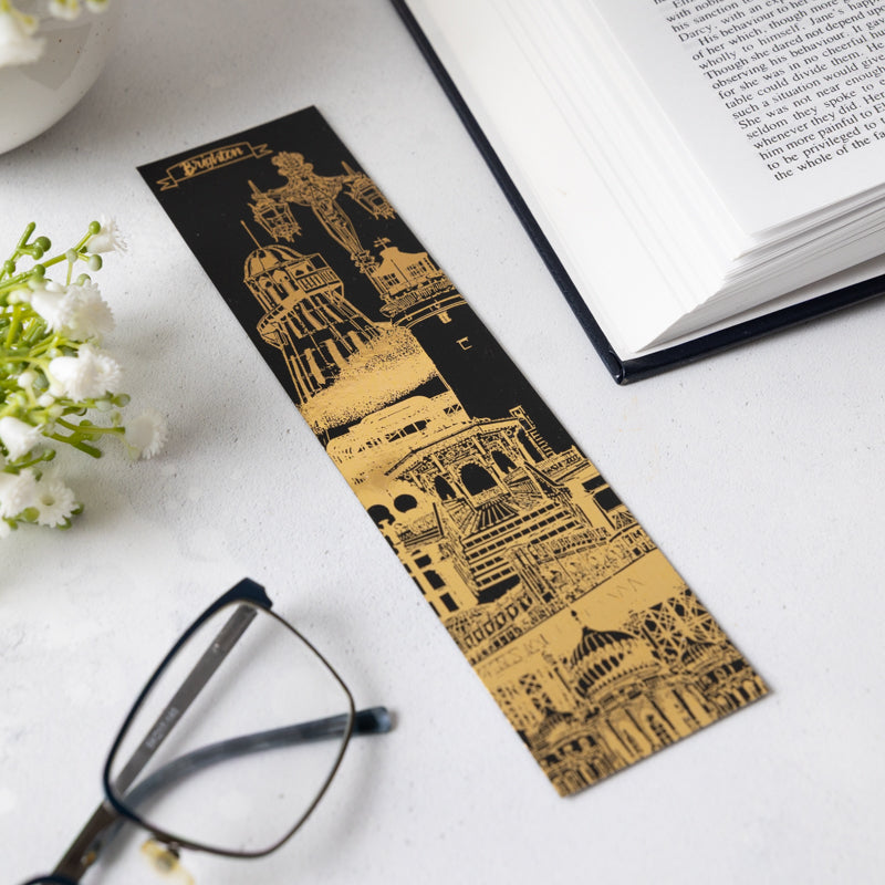 Brighton landmarks gold foil bookmark on a white background with white flowers