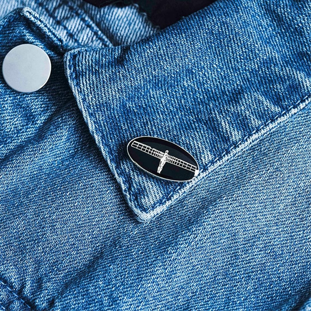 Angel of the North Pin Badge - PowderButterfly Angel of the North Pin Badge with black and gold enamel illustration 