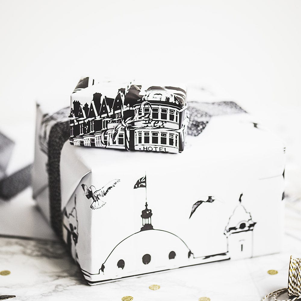 PowderButterfly Whitley Bay Gift Wrap with black and white illustration of whitley bays landmarks and monuments
