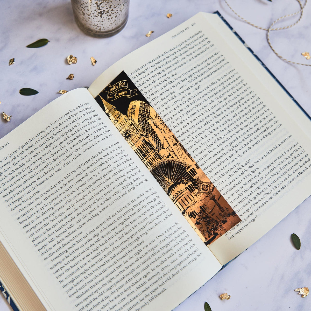 PowderButterfly Stationery London Gold Foil Bookmark complete with gold foil illustration of London monuments and landmarks