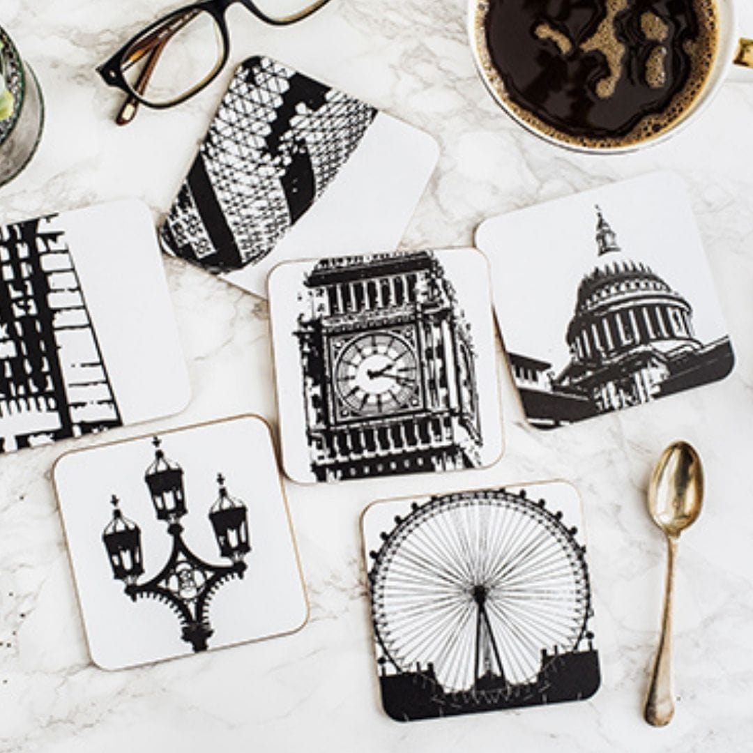 PowderButterfly London Coaster Set (Pack of 6) with black and white illustrations of different landmarks or monuments on each coaster