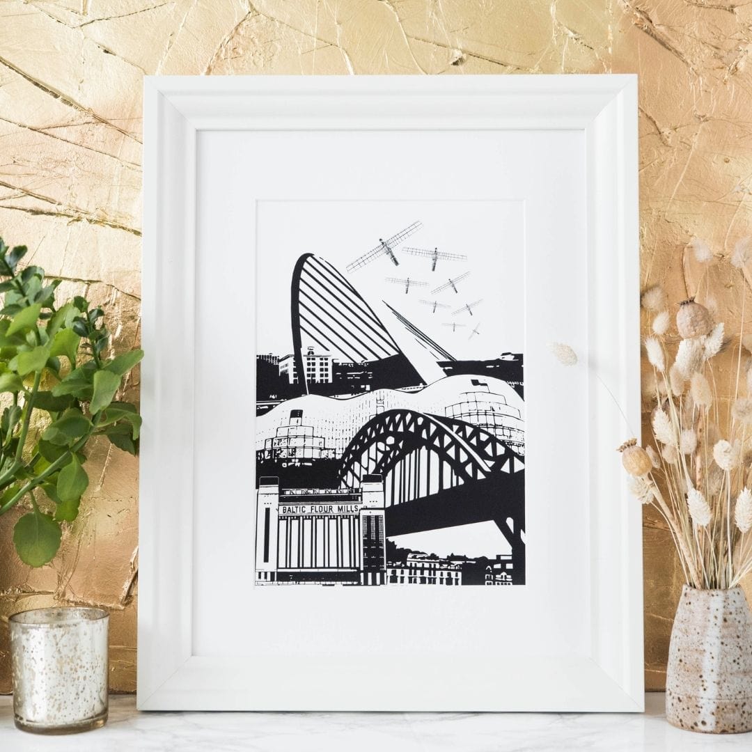 PowderButterfly Framed Newcastle Print illustrated in black and white featuring Newcastle and Gateshead monuments and landmarks