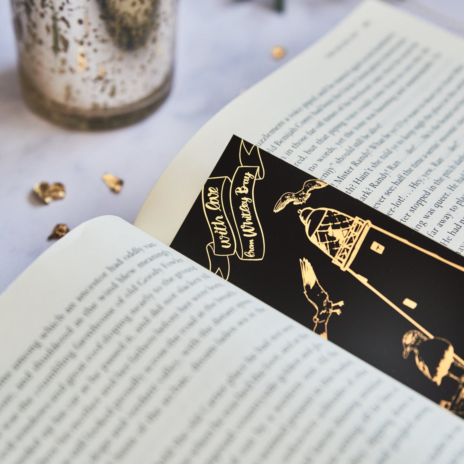PowderButterfly Whitley Bay Gold Foil Bookmark complete with gold foil illustrations of whitley bay monuments and landmarks