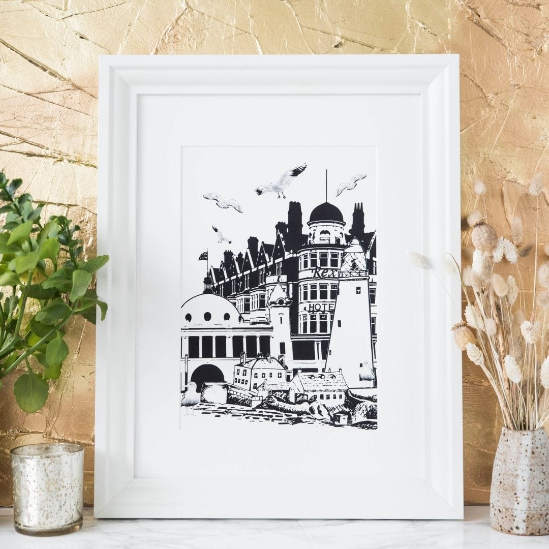 PowderButterfly Framed Whitley Bay Print with black and white illustrations of whitley bays monuments and landmarks
