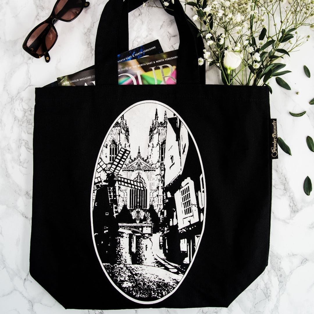 PowderButterfly York Tote Bag in black with black and white illustrations of Yorks monuments and landmarks